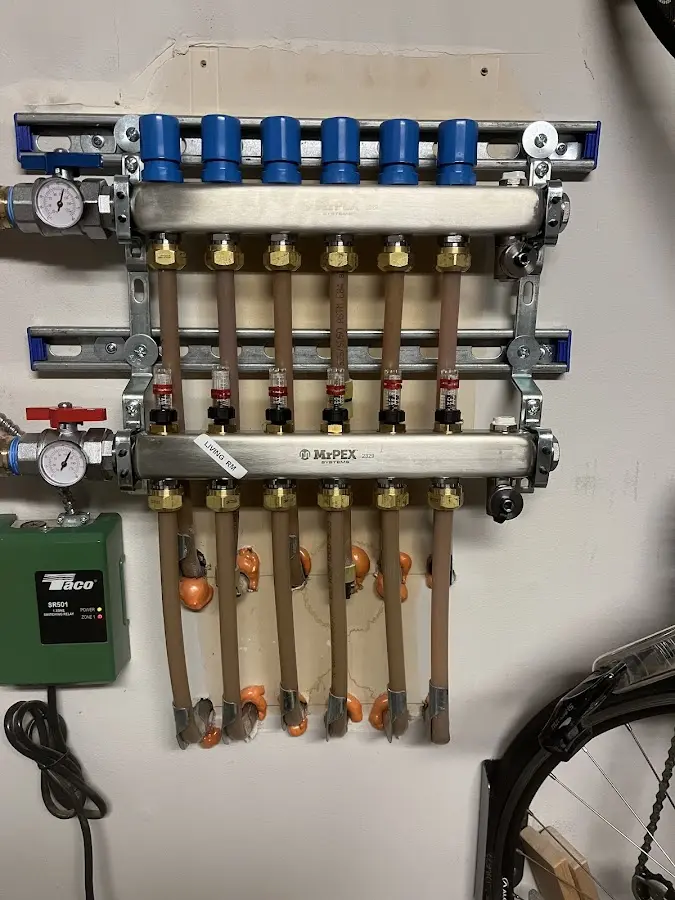 Plumber performing Gas Leak Detection at a residential property in Harding